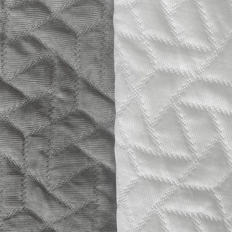 Close-up of grey and white quilted fabric texture used in Australian made dog beds