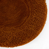 Fur seal coloured corner of a luxury dog bed with a textured surface for comfort