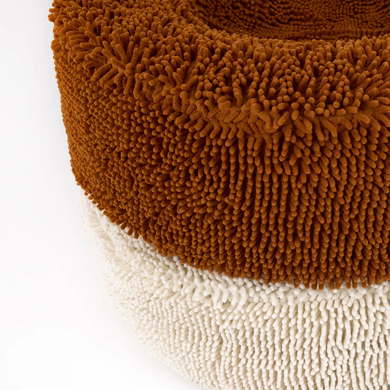 Close-up of a textured brown and cream dog bed from Barney Bed Australia