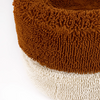 Close-up of a textured brown and cream dog bed from Barney Bed Australia