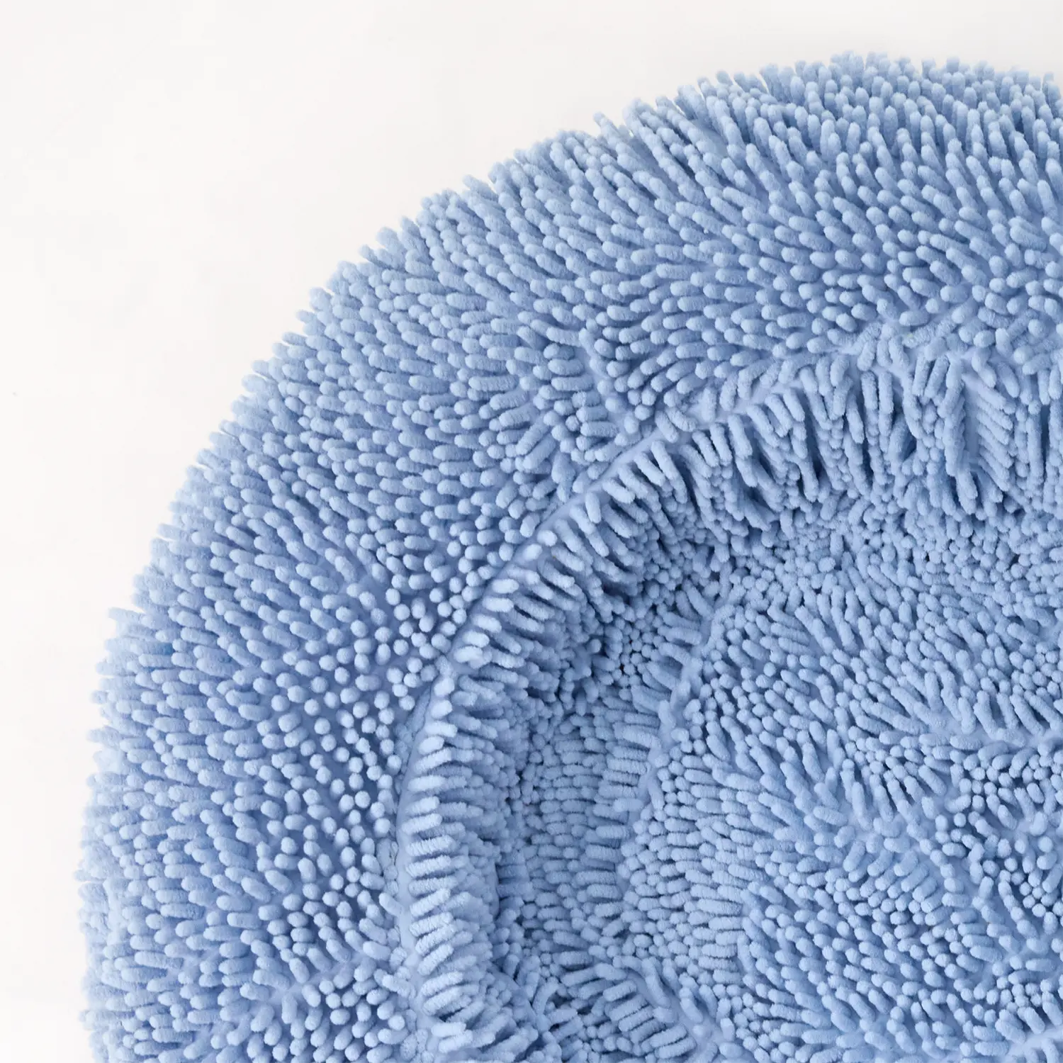 Powder blue dog bed with a textured surface designed for comfort and style