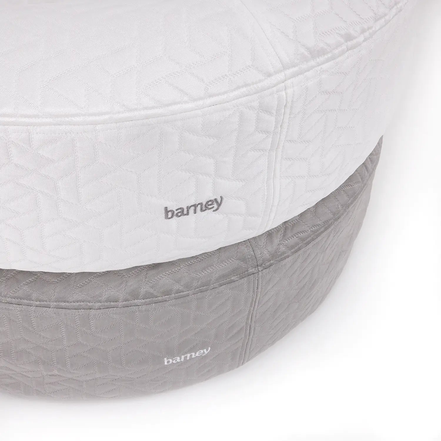 Iceberg and grey cooling dog beds stacked together