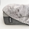Grey luxury dog bed blanket with soft, textured fabric and a Barney label on the side