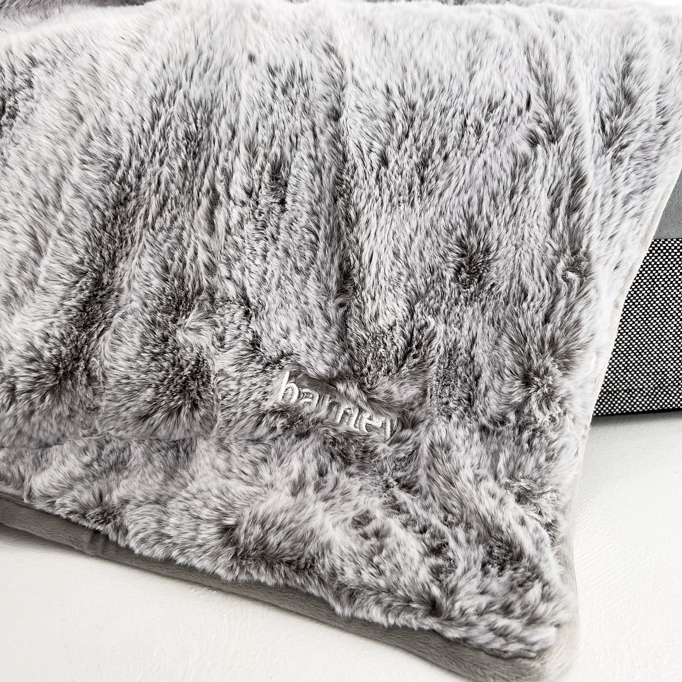 Grey luxury dog bed blanket with soft faux fur texture and