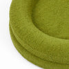 Green luxury dog bed with soft, textured fabric designed for comfort and style