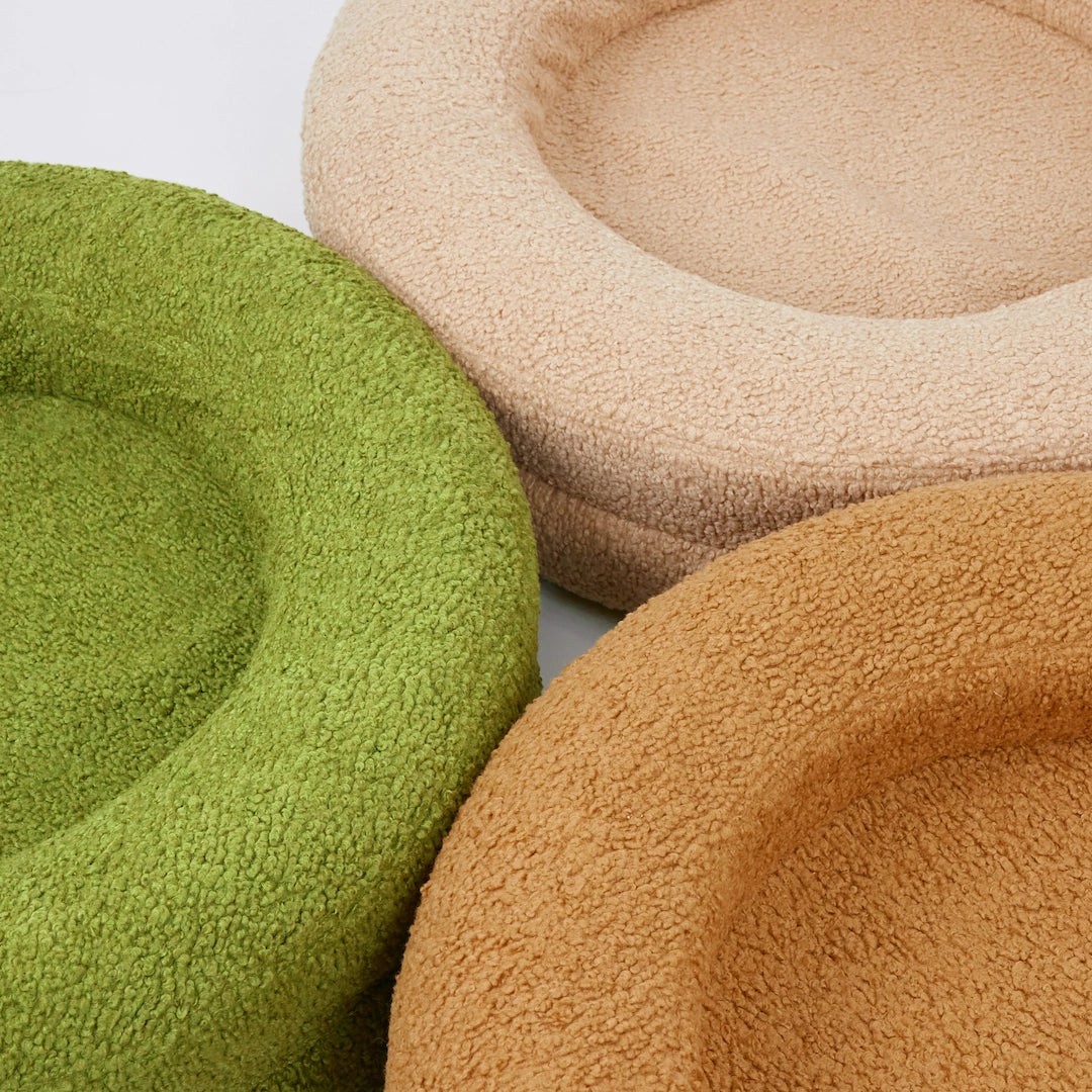 BarneyCurl Bed available in 3 colors | Three Australian made dog beds in green, beige, and tan colours arranged together