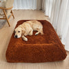 Golden Retriever resting on a fur seal coloured luxury dog bed