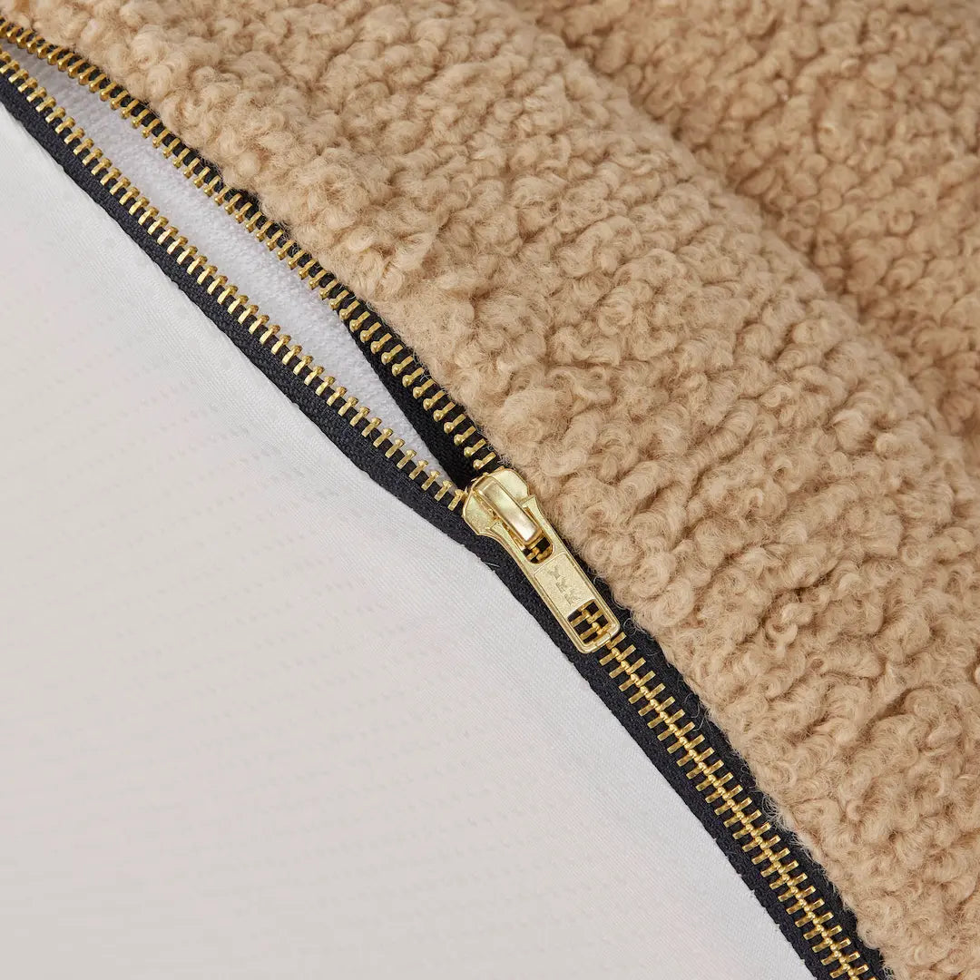 Close-up of a beige dog bed zipper detail from Barney Bed Australia